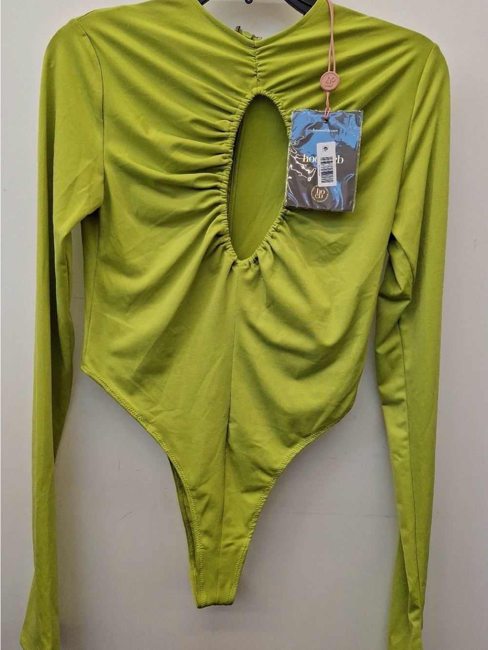 House of CB. NWT Lime Green Cutout Bodysuit. Size M